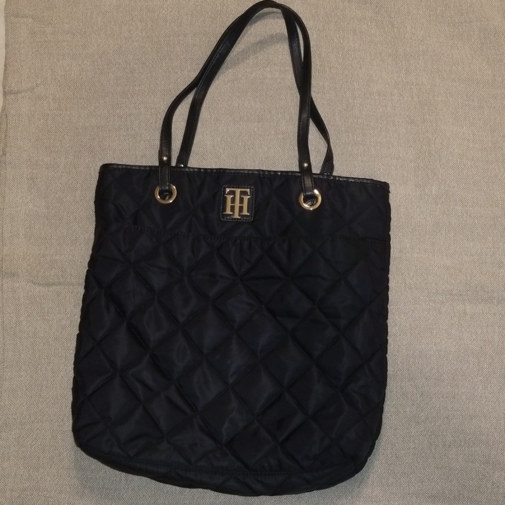 TOMMY Hilfiger,  slightly  used bag w/ gold accent
